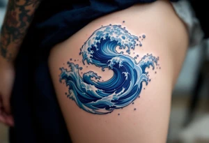 A navy blue "S" formed from ocean waves with white foam accents. tattoo idea