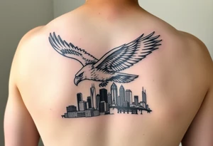 Philadelphia Eagle flying over Philadelphia city skyline with go Birds under it tattoo idea