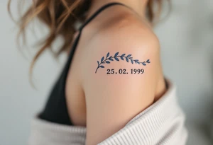 Cursive date 25. 02. 1999 flowing along the spine in cool gray with a hint of icy blue. tattoo idea