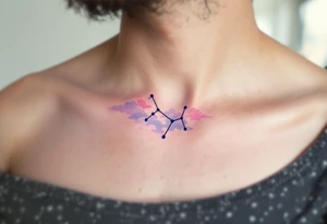 A soft pastel rendering of the Capricorn constellation on the collarbone, with pink and lavender clouds behind it. tattoo idea