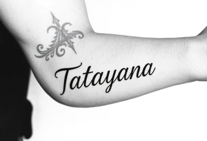 Tattoo for a man that says the name “Tatayana” tattoo idea