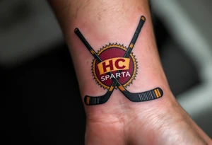 Two crossed hockey sticks with the HC Sparta crest in deep red and yellow centered on the wrist. tattoo idea