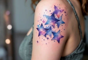 Watercolor-style Capricorn stars in soft blues and purples, fading like a cosmic dream across the shoulder. tattoo idea