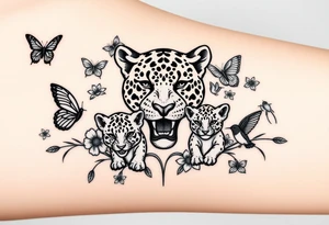 head of 3 jaguars (1 mother and 2 cubs) surrounded by butterflies and hummingbirds in new old school style tattoo idea