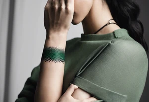 lines around wrist, abstract, green and black, covered from wrist to forearm, fully covered, no borders, blackwork, no people tattoo idea