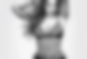Underboob tattoo that follows the shape of the boob tattoo idea