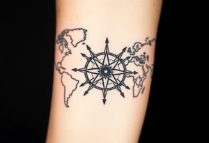 antique compass rose overlaid on weathered world map with sailing ships tattoo idea