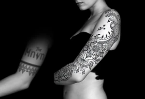 bold line dark shamanstyle tattoo idea