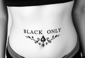 text reading "BLACK ONLY" across a womb tattoo decorated with spades tattoo idea