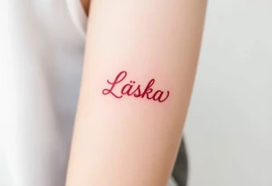 An infinity symbol with the word "Láska" in deep red blending into the design tattoo idea