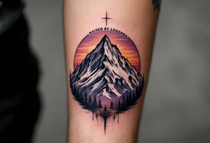 A mountain landscape in dusky purples and oranges with “Raised by Legends” above it. tattoo idea