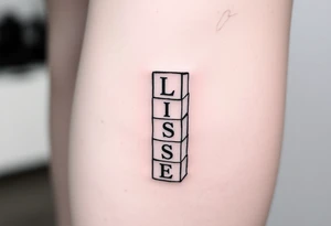 childrens blocks with ELISE on them vertically arranged on the calf tattoo idea