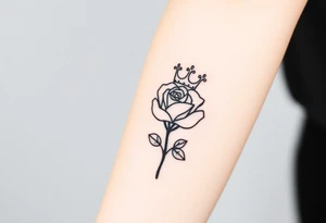 A rose with a kings crown ontop tattoo idea