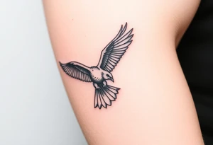 Bird catching prey tattoo idea
