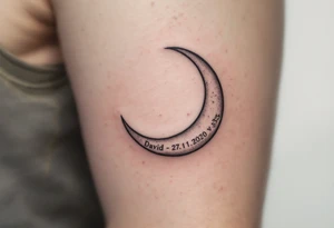 Crescent moon with "David – 27.11.2020 v 3:33" nestled in its curve, done in silver-gray and black. tattoo idea
