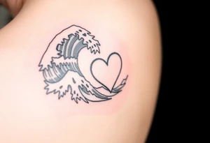 SEA WAVES IN BICEP, SUBTLY, THE HIGHEST TIDE BECOMES A HEART. tattoo idea