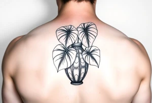 Large Decorative vase with large monstera leaves tattoo idea