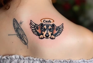 Dachshund ears between wings with a halo above and the name Cash tattoo idea