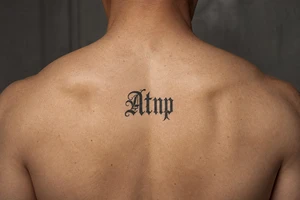 Atnp in old English calligraphy tattoo idea