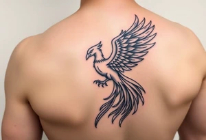 magnificent phoenix rising from golden flames with trailing embers tattoo idea