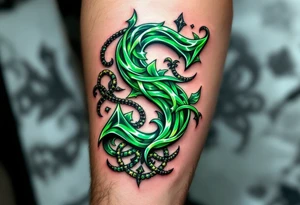 A shiny emerald green "S" with intricate Celtic knotwork wrapped around it. tattoo idea