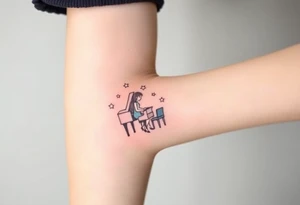 woman playing piano under the stars tattoo idea