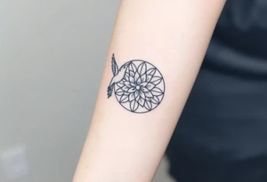 A hummingbird hovering near a Flower of Life centered in round cyrcle, representing harmony and the energy of life. tattoo idea