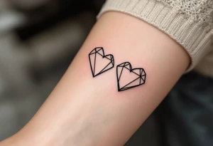 A pair of geometric hearts in black and gold ink etched into the forearms, symbolizing balance and unity. tattoo idea
