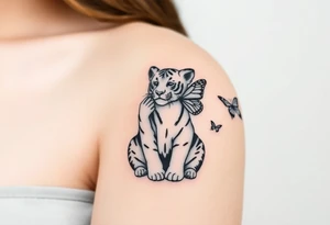 Tiger cub sitting down with paw up and on the paw is sitting a butterfly and there’s two butterflies on each side tattoo idea