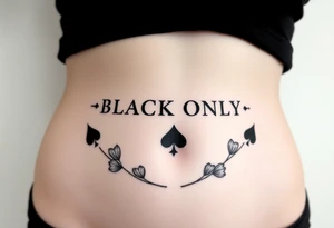 text reading "BLACK ONLY" across a womb tattoo decorated with spades tattoo idea