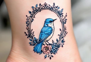 Blue bird coverup in a floral mirror frame tattoo idea