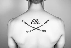 Ella with hockey sticks for L tattoo idea