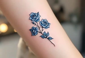 Miniature blue roses outlined in black, with watercolor shading for a dreamy, surreal effect. tattoo idea