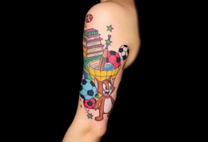 Childhood memories of a small pile of books, a bucket and spade, a football, a cricket bat, a cartoon of Tom from Tom and Jerry tattoo idea