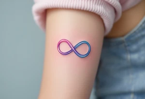 A soft pastel infinity symbol blending sky blue and pink, ending in a gentle heart shape. tattoo idea
