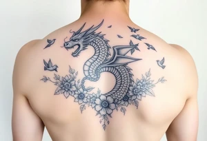 powerful majestic dragon, surrounded by floral ornaments and birds tattoo idea