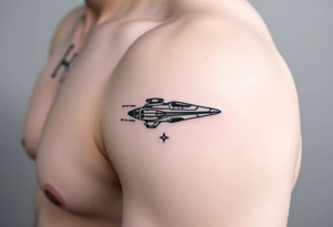 Shoulder tattoo of a spaceship and a star. tattoo idea