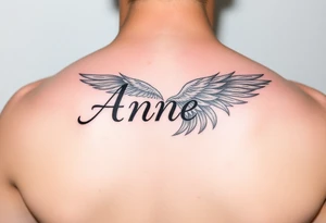 the name Anne in a phoenix feather tattoo idea