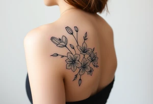 botanical tattoo with flowers such as tulips and lilies and cherry blossoms on the upper arm tattoo idea