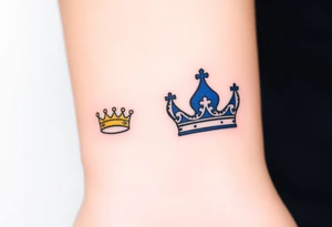 A tiny crown for the child and a regal crown for the parent, in soft gold and deep royal blue, symbolizing unconditional love and royalty tattoo idea