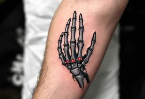 A skeletal robotic hand with bone-like mechanical segments in matte gray, accented by red heat signatures at each joint. tattoo idea