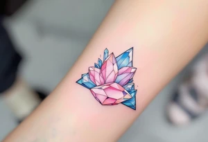 A triangle with crystal patterns in pastel pinks and blues, symbolizing clarity and energy. tattoo idea