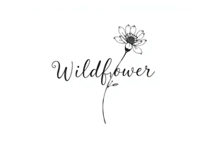 Wildflower written in stem of a flower tattoo idea