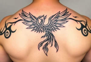 magnificent phoenix rising from golden flames with trailing embers tattoo idea