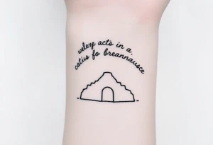 We believe in ordinary acts of bravery" arched over a silhouette of the Dauntless compound entrance tattoo idea