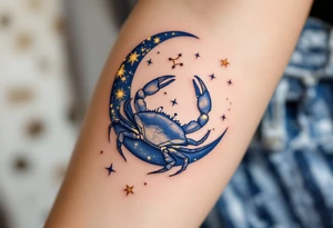 A crescent moon with crab in navy cradles the Cancer constellation in glowing gold ink. tattoo idea