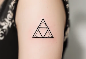 A minimalist black ink triquetra, with fine-line detailing and subtle shading for a clean, timeless look. tattoo idea