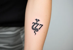 Minimalist black ink tattoo design of a small snake coiled around the number 777. tattoo idea