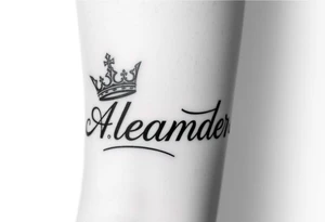 Name tattoo that says Evan Alexander with a crown on forearm tattoo idea