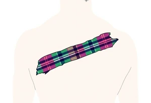 arm Dark Purple with green pink blue and white highlights tartan fabric with flesh peeling away at edges tattoo idea